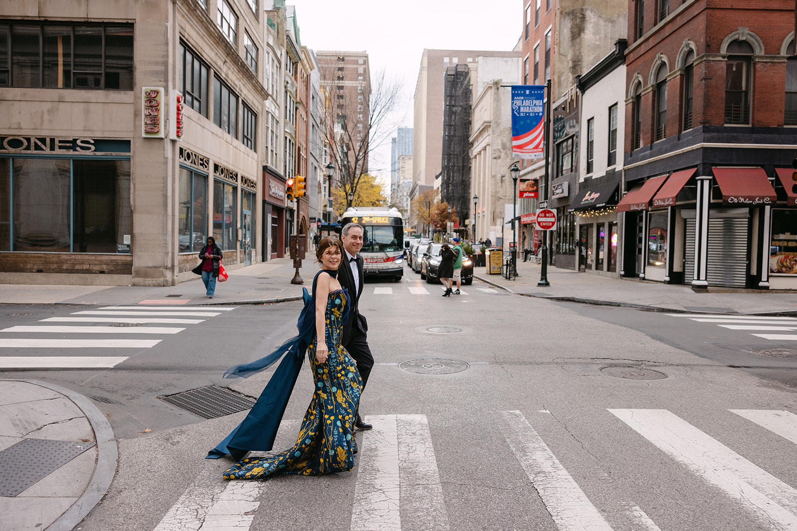 Bride and groom walking through Philadelphia, reflecting the personal and modern wedding trends of 2027.